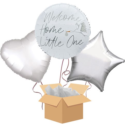A new baby balloon bouquet featuring a silver star and heart balloon either side of a white hello little one balloon popping out of a brown cardboard box